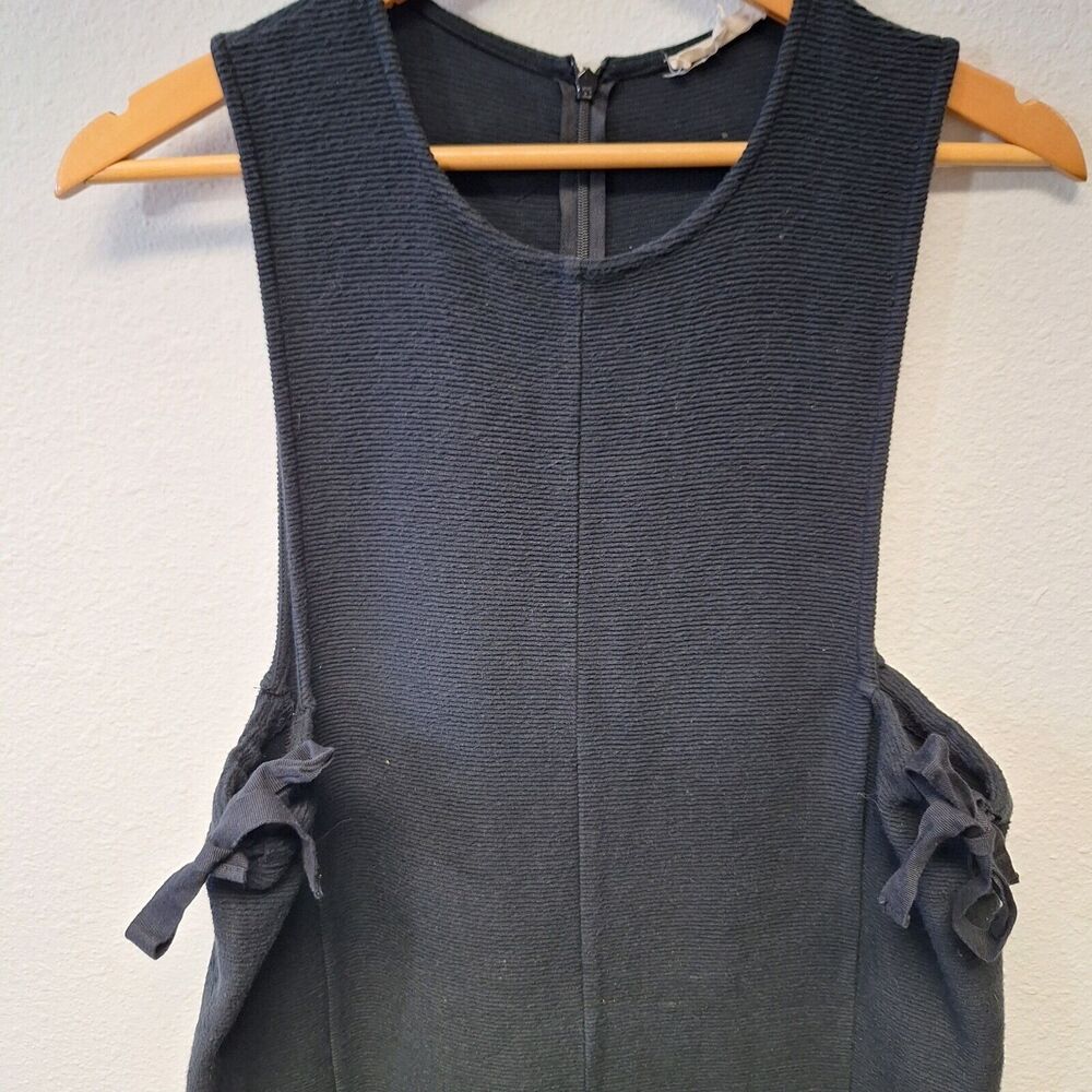 Black Sleeveless Wide-Leg Jumpsuit with Side Tie Detail - Picture 4 of 12